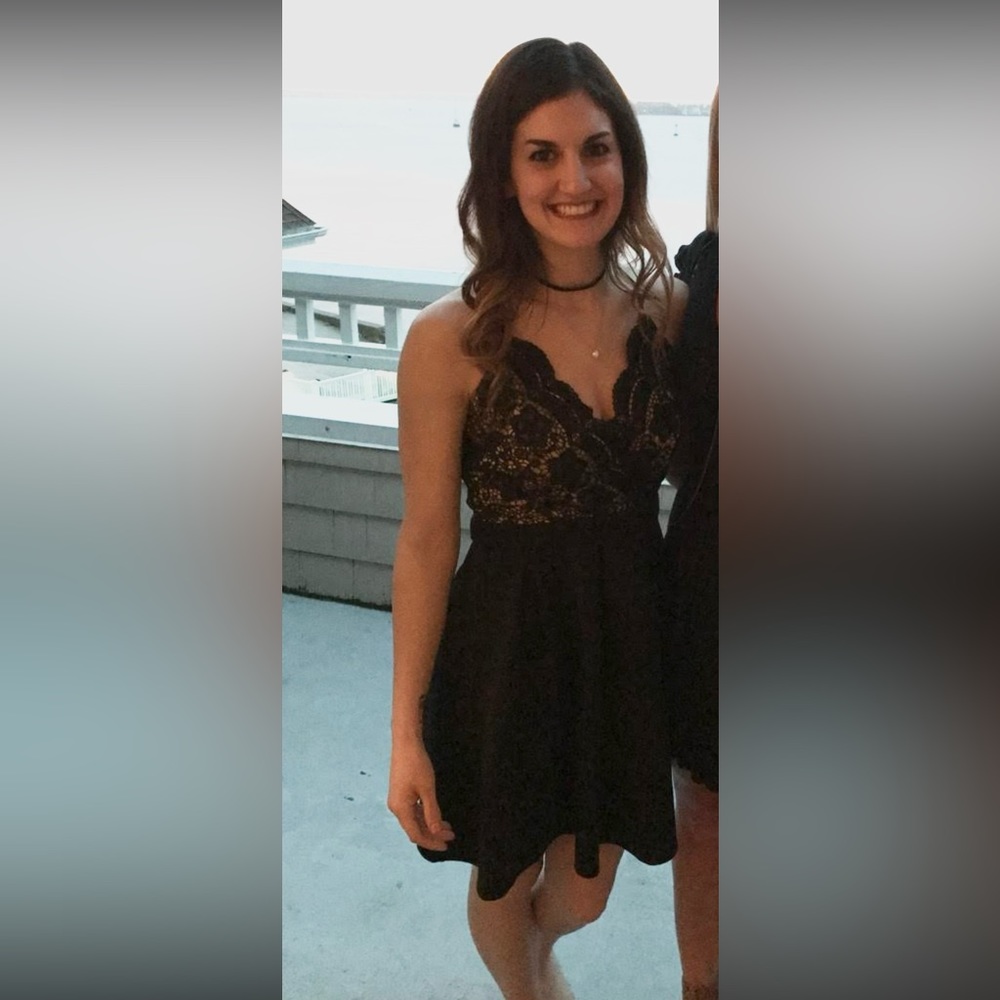 Francesca’s Black Lace Top Mini Dress with Cross Back